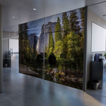 Perforated glass wall